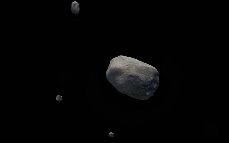 Впечатление художника от Электры, четверной системы астероидов.