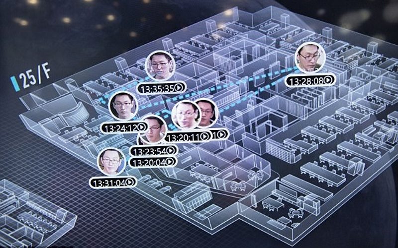 The system has been helping Shanghai's police force track down criminals in a city with more than 24 million inhabitants. Pictured is Dragonfly Eye tracking employees in Yitu Technology's Shanghai headquarters.